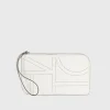 Monogram leather wristlet pouch milk