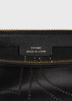 Monogram leather wristlet pouch black