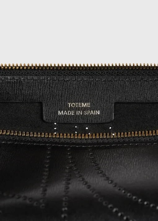 Monogram leather wristlet pouch black