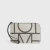 Monogram travel pouch ecru