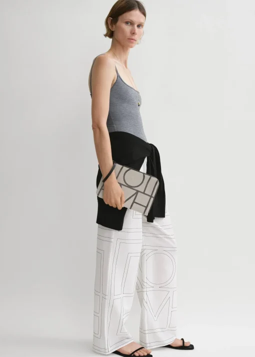 Monogram travel pouch ecru