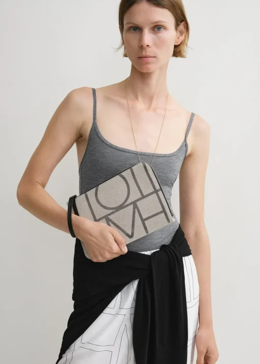 Monogram travel pouch ecru